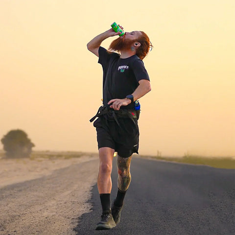 Hardest Geezer drinking a perfectted energy drink whilst running